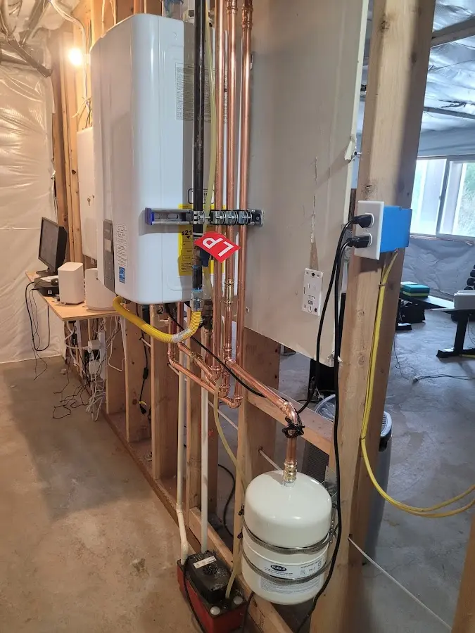 Licensed plumber repairing a kitchen sink in Black Forest